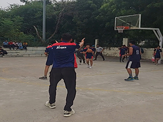 Student Playing Basketball 